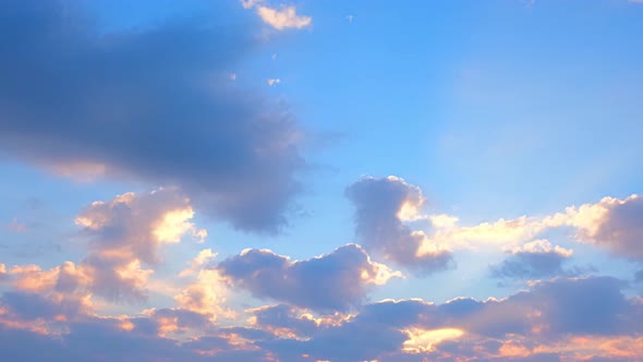 4K : Time lapse of colorful sky during beautiful sunset.  Romantic clouds.