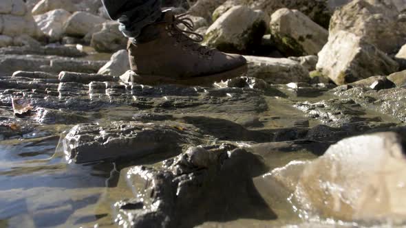 CloseUp Active Traveler Person Walks Along the River to Mountains Hike Voyage