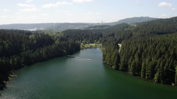 Floating Dock at Lake Belcarra Regional Park Port - sunny forwarding aerial shot