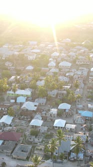 Zanzibar Tanzania  Aerial View of Houses Near the Coast Vertical Video