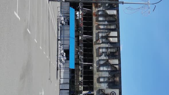 Vertical Video of a Destroyed Building of a Shopping Center in Bucha Ukraine