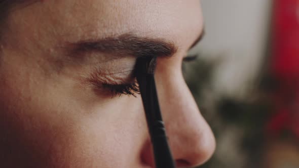 Transgender Man Applying Eyeshadow