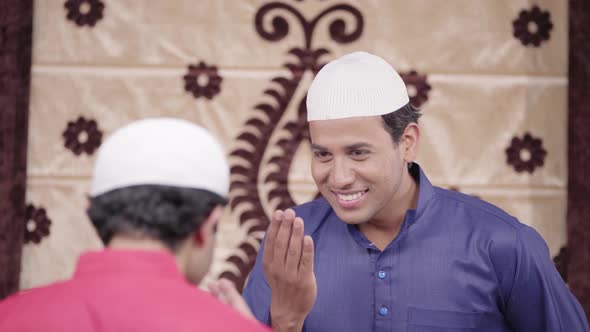 Muslim man greeting his friend