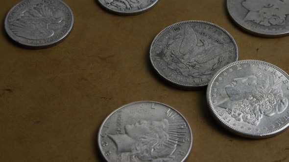 Rotating stock footage shot of antique American coins - MONEY 0055