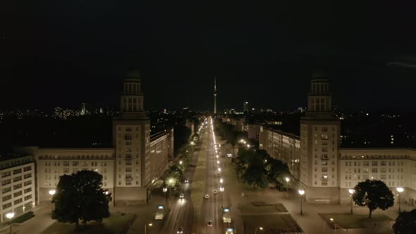 Aerial View of Empty Karl-Marx-Allee Street at Night Towards Alexander Platz TV Tower in Berlin