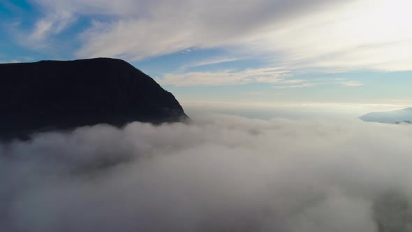 Mountain Landscape With Low Clouds