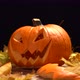 Jack O Lantern Halloween Pumpkin on Yellow Leaves - VideoHive Item for Sale
