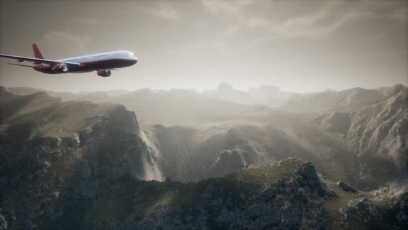Passenger Aircraft Over Mountain Landscape