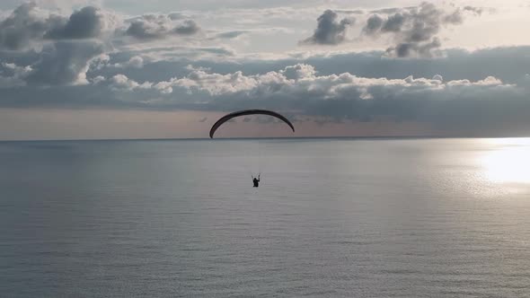 Aerial view 4 K parachute jumper flying over beautiful Alanya