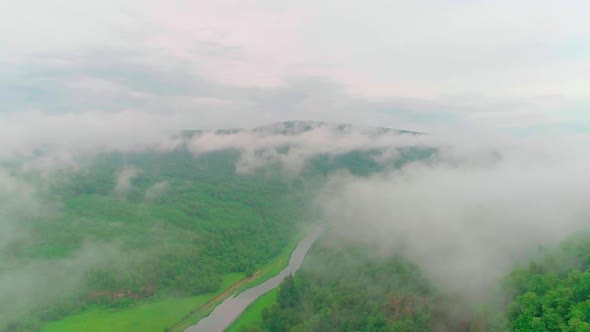 Aerial Video of Clouds Mountains Forest and Mountain River