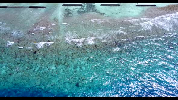 Aerial top view panorama of paradise shore beach adventure by shallow ocean with white sandy backgro