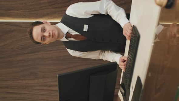 Portrait of Male Hotel Receptionist