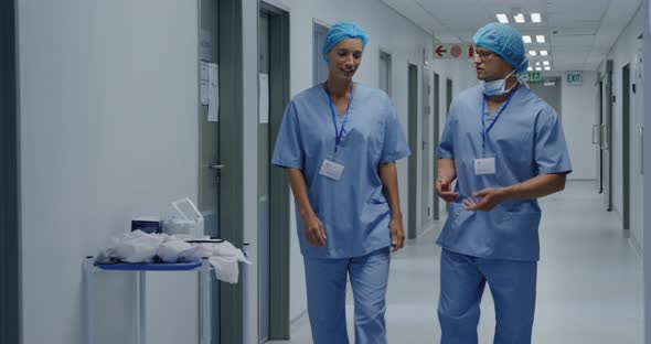 Medical professionals working at a hospital alt