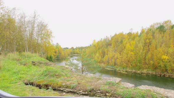 View to River From Car Trunk with Blanket and Tea