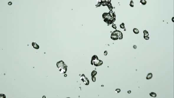 Water pouring and splashing in ultra slow motion 1500fps on a reflective surface - WATER POURS 135