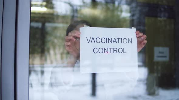 Woman in Mask Putting Up Entry Covid Requirements International Coronavirus Measures Vaccination