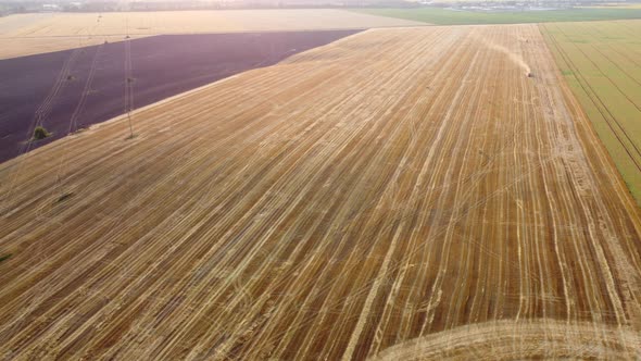 Aerial Drone View Flight Over Different Agricultural Fields Field After Harvest