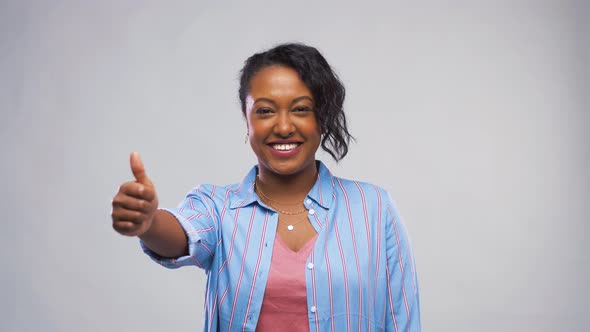 Happy African American Woman Showing Thumbs Up 11