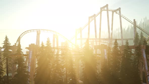 Old Roller Coaster at Sunset in Forest