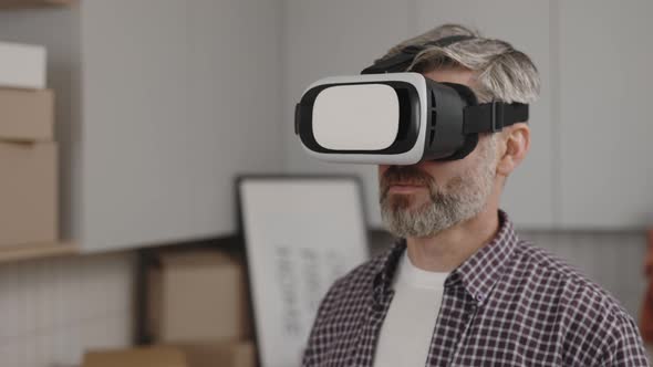 Close View of the Man Has Put on Vr Technology and Estimates the Apartment Already Furnished