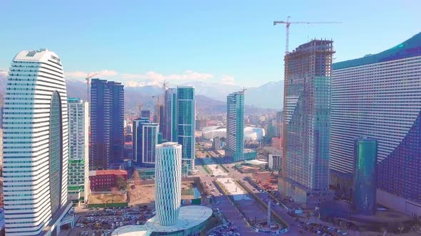 The process of construction of high-rise modern buildings in the city center.