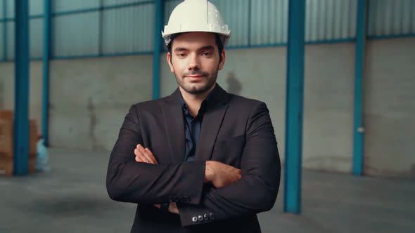 Portrait Confident Factory Manager Wearing Suit and Safety Helmet