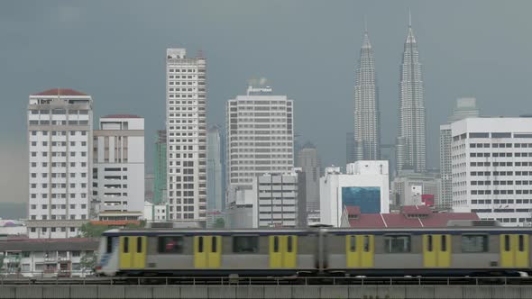 View of Train on the Foreground and Modern Buildings Skyscraper on the Background