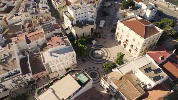 Gil Eanes square and Posto de Turismo,  Lagos, Algarve, Portugal. Orbiting aerial shot
