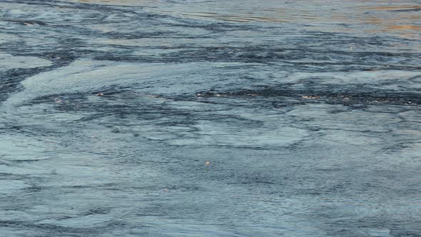 Waves of Water of the River and the Sea Meet Each Other During High Tide and Low Tide