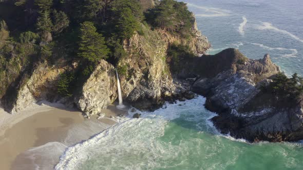 Aerial Panning Around Shot of McWay Falls on the Coast of Big Sur California