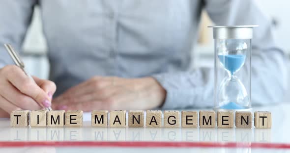 Business Person Draws Up Time Management Plan Closeup