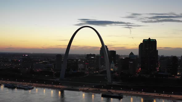 St. Louis Arch Late Sunset Downtown Aerial Pan Right
