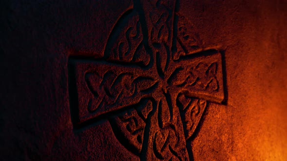 Old English Cross Carving In Rock Wall alt