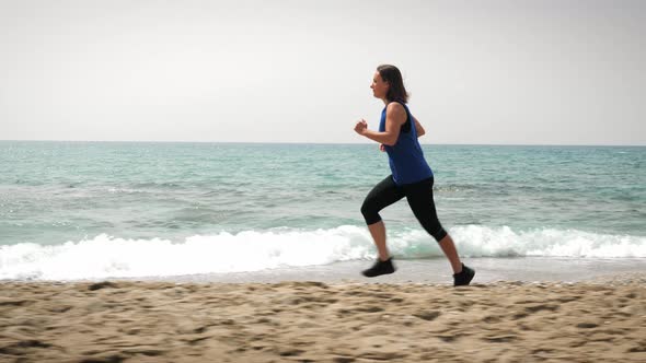 Woman running on beach