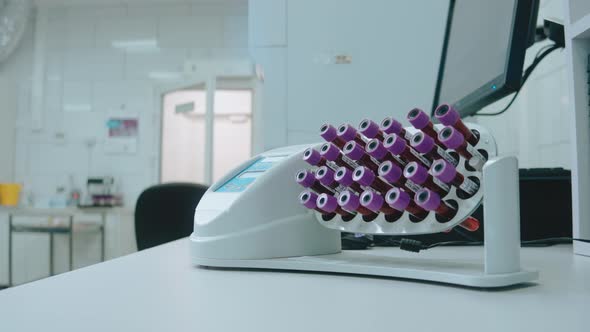 Centrifuge in Research Chemical Laboratory Mixer with Blood Samples