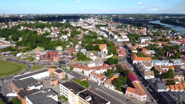 Aerial View, Downtown Neighborhood of Kaunas, Lithuania. Buildings and Streets on Sunny Day. Drone S