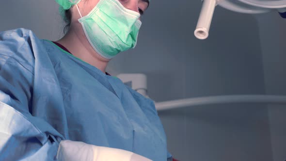 Women Performing Surgery In Hospital Together