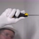 Builder Worker Makes Repairs in Apartment Screwing Screw in a Concrete Wall - VideoHive Item for Sale