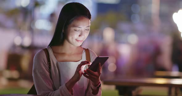 Woman use of mobile phone in coffee shop