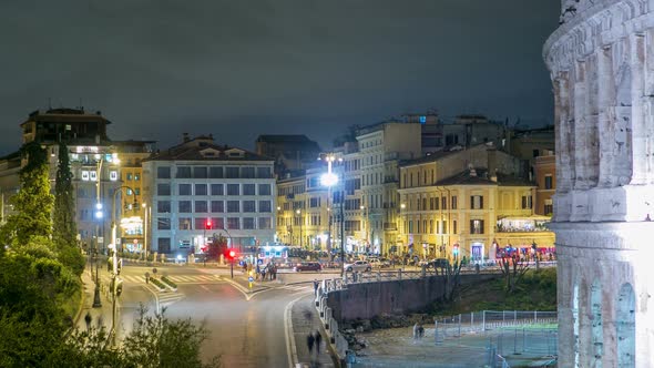 View of Square Near Colosseum Illuminated at Night Timelapse in Rome, Italy