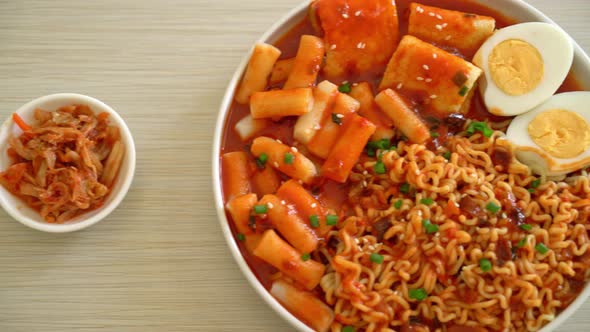 Korean instant noodles with Korean rice cake and fish cake and boiled egg - Rabokki - Korean food st