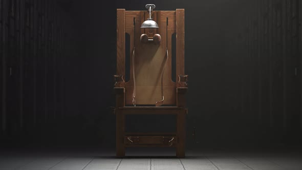 Wooden electric chair in the spotlight in a prison block. Vertigo shot. 4K HD