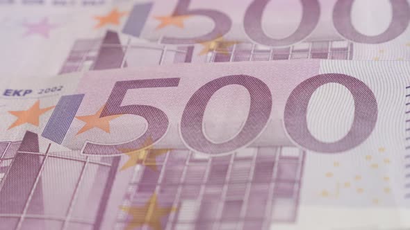 Shallow DOF currency of EU in 500  denominations 4K 2160p 30fps UltraHD panning footage - Slow pan E