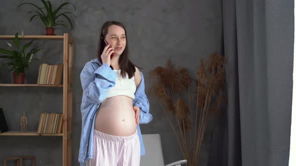 Pregnant Woman Back Pain Pregnancy Discomfort Call to the Doctor Expectant Mother's Lower Back