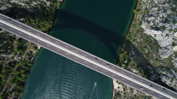 Aerial top view of a bridge over Krka river in Croatia. Big bridge above water.