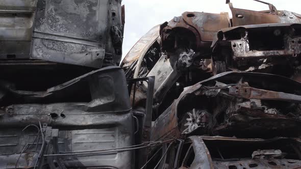 War in Ukraine a Dump of Burned Cars in Irpin Bucha District