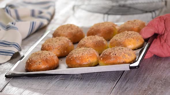 Freshly Baked Yeast Buns with Crumble on Baking Sheet. Sweet Bread.