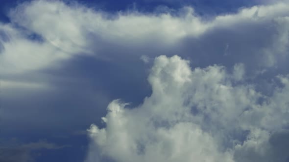 Timelapse Daytime Sky with Fluffy Clouds