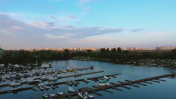 Aerial View of Boats Docked in a Small River Port