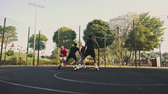 Basketball Team Trains on the Court